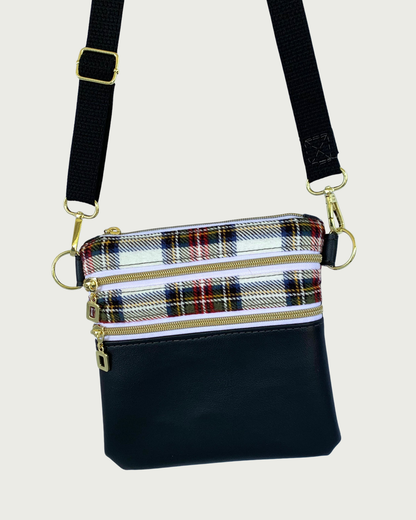Handcrafted classic red, black, and white plaid crossbody bag with black faux-leather accents, gold-tone hardware throughout including zipper details on top closure and two pockets, and a black adjustable, detachable cotton webbing shoulder strap, shown on a light gray background.